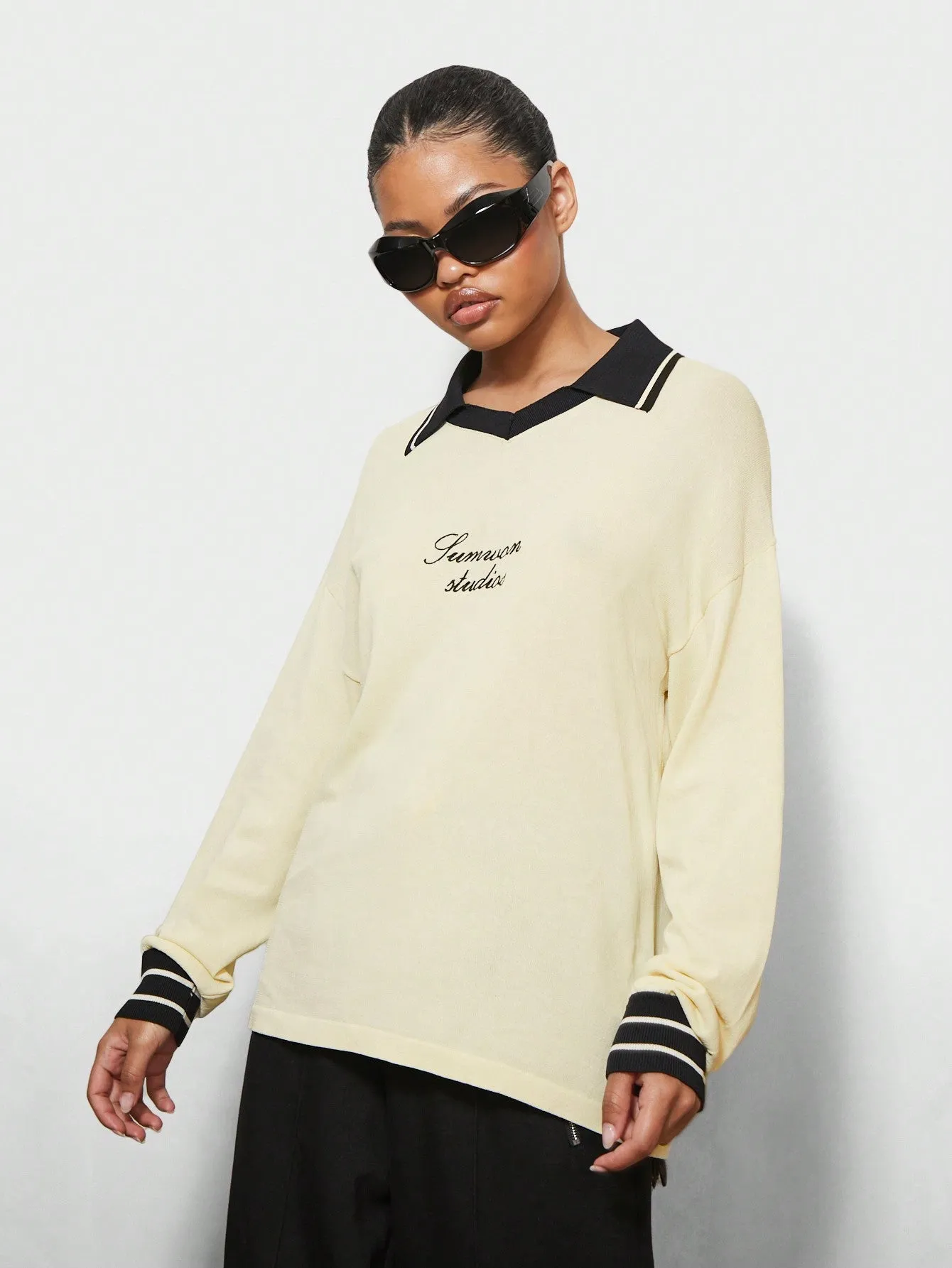 SUMWON WOMEN Oversized Fit Football Knit Contrast Collar And Stripe Cuffs Sweater With Embroidery