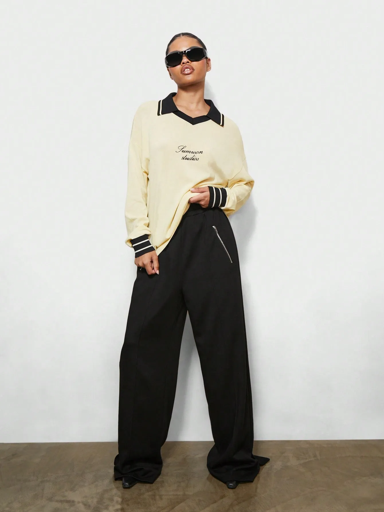 SUMWON WOMEN Oversized Fit Football Knit Contrast Collar And Stripe Cuffs Sweater With Embroidery