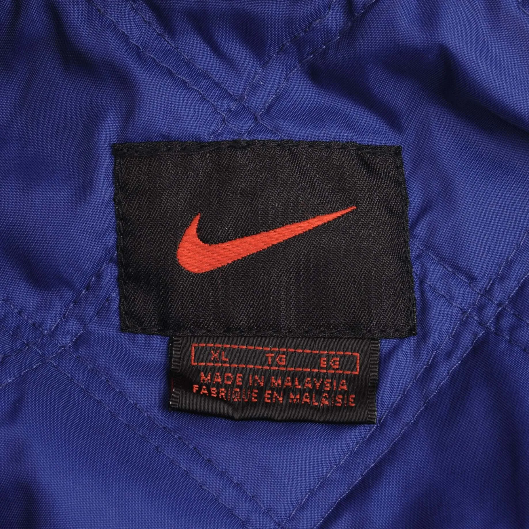 VINTAGE NIKE SPELLOUT SWOOSH WINDBREAKER JACKET 1990S SIZE XL